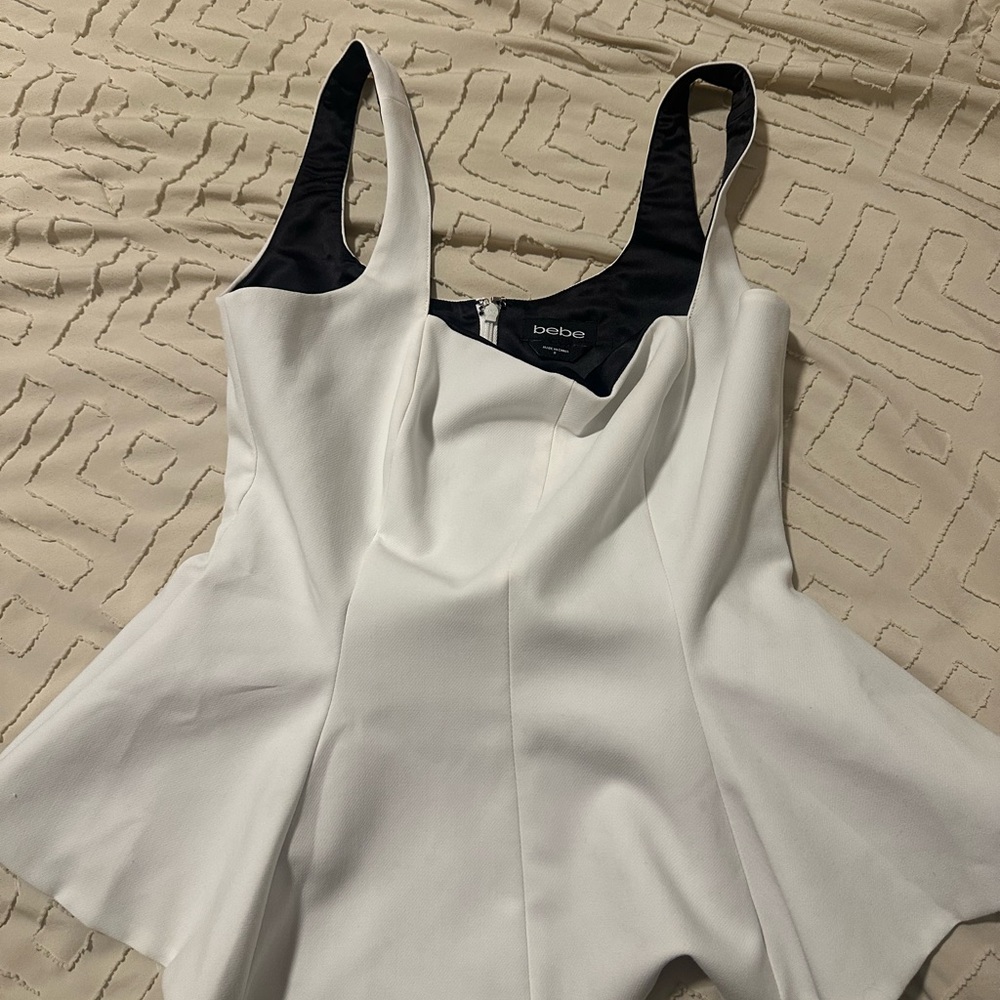 Bebe White and Black Peplum top